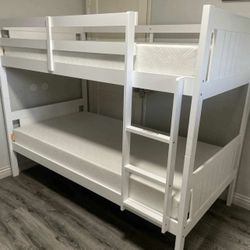 Twin over twin bunk bed. White or espresso. Assembly required. Assembly not included. Taxes included. Free delivery.  Bunk Bed only without Assembly-$
