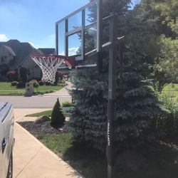 Goaliath 54 inch in ground basketball hoop, adjustable basketball court