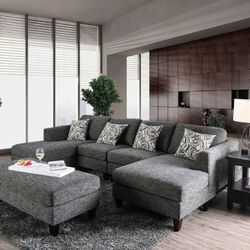 Lowry Sectional And Ottoman Gray