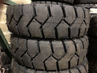 Pair of 650x10 forklift tires $100