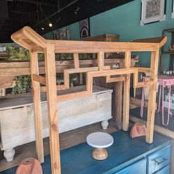 Arch Style Mindi Wood Console