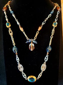 Vintage Chico's double strand necklace. Copper colored chain with various multicolored glass beads. Necklace is 30 in.