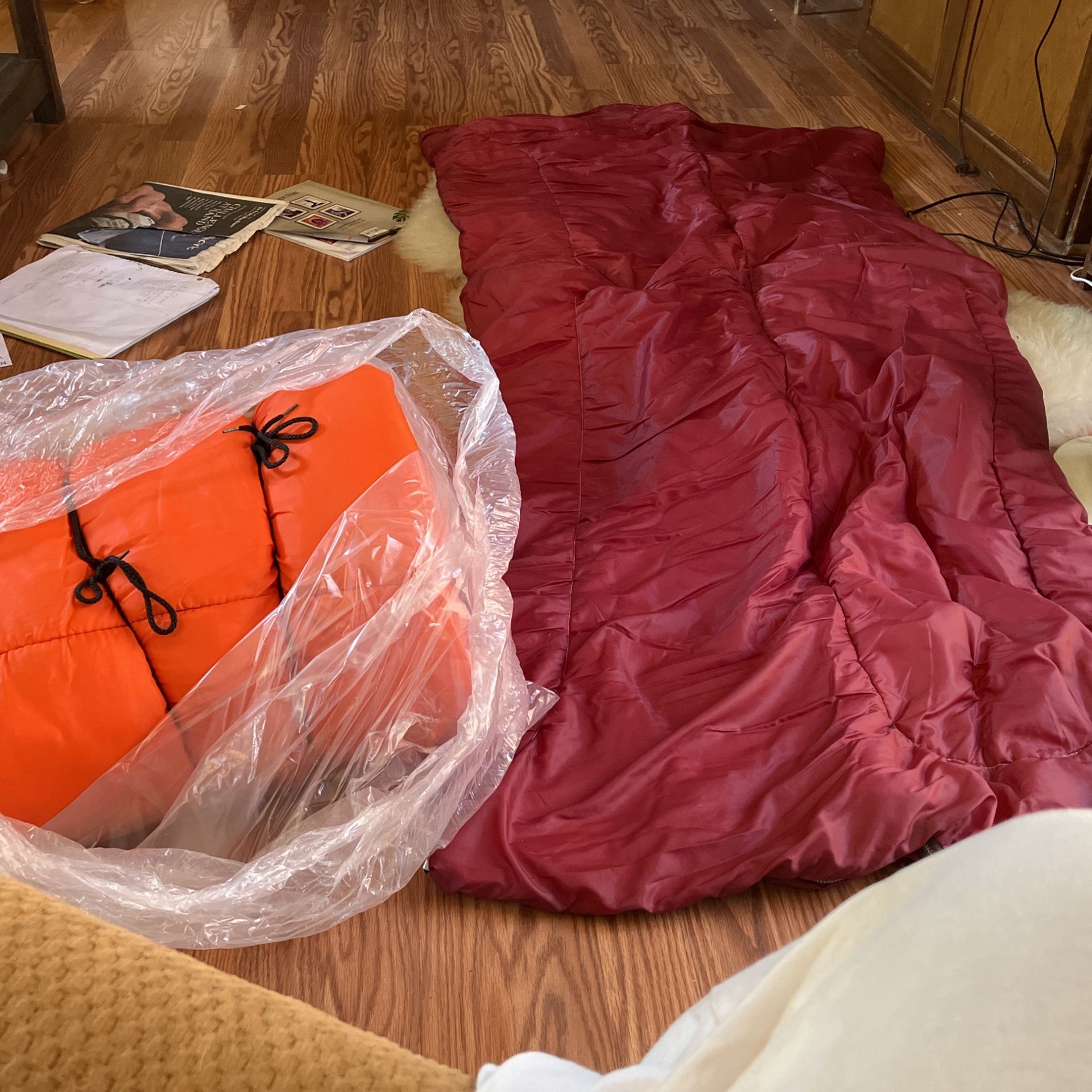 2 Nylon Sleeping Bags Bright Orange And Maroon