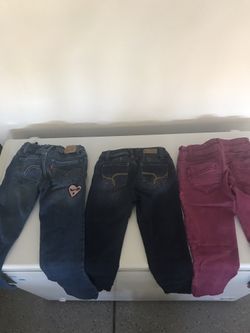 One Levi’s jeans and 2 other pairs of jeans for girls size 7-8 for ages 6-8