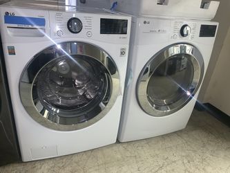 New LG front load steam washer & electric dryer set with warranty