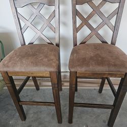 2 Expensvie Wood Bar Stools  