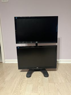 Two AOC Monitors On A Stand