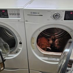 Bosch Washer And Electric Dryer On Pedestals