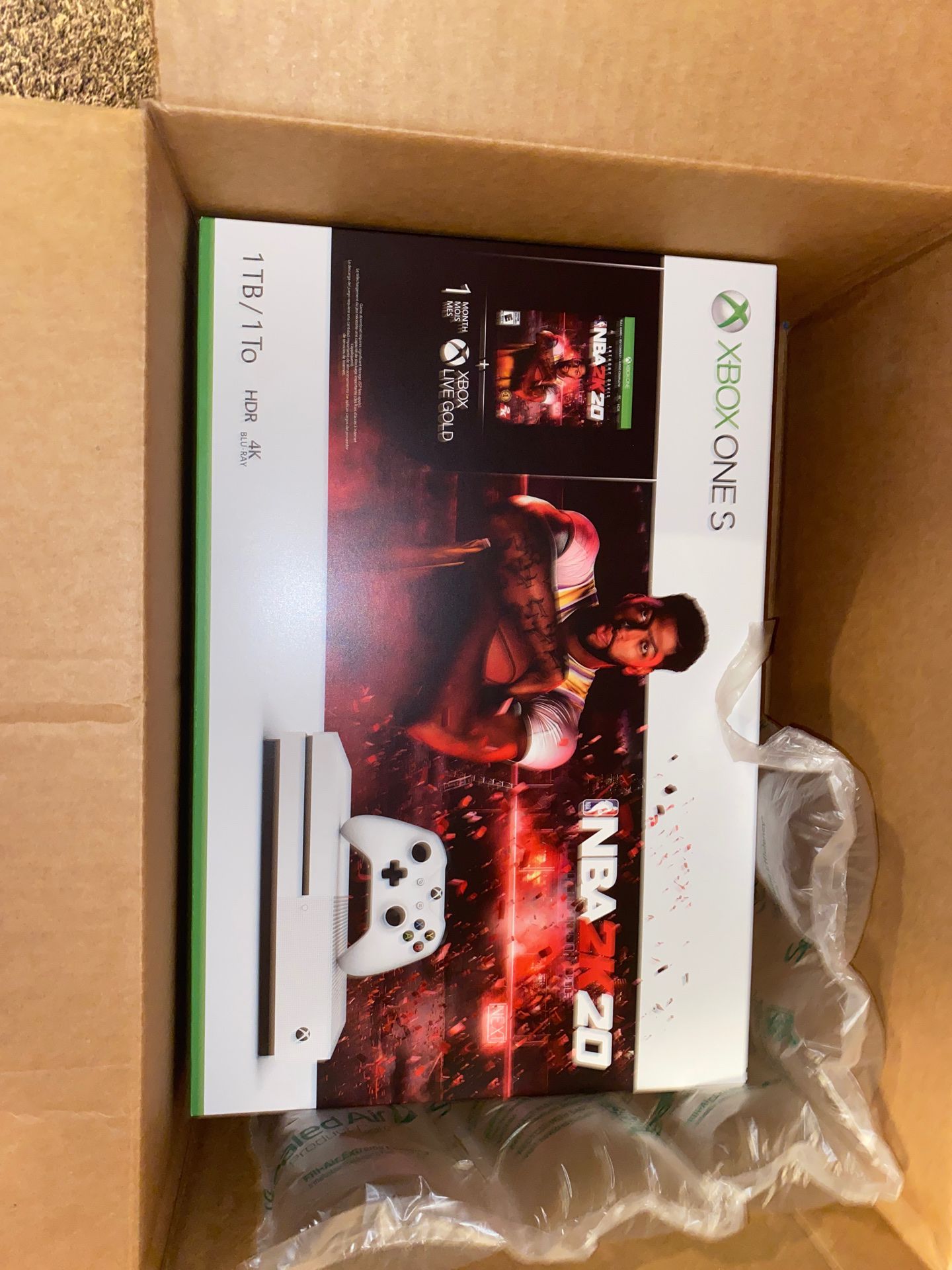 Brand new Xbox one s 1 terabyte (still in box) comes w nba 2020