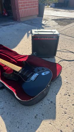 Black Electric Guitar with Case and Amp