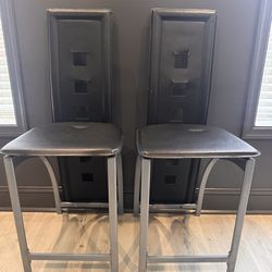 2 black leather chairs $10 for both pick up only
