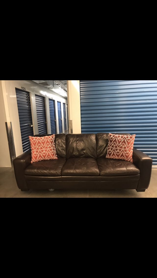 Comfy Leather Couch (free delivery) 