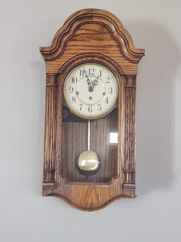 Howard Miller Pendulum Wall Clock - Oak