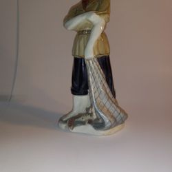 Porcelain Fisher Man