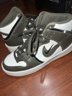 Olive green and white Nike high tops