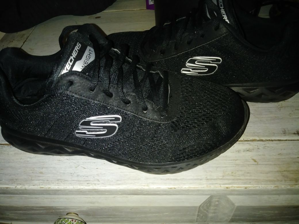 New black Sketchers. Boys 8 or girls. Solid black. Son wore them for 20 mins. And there to small. Cant return since he wore them outside.