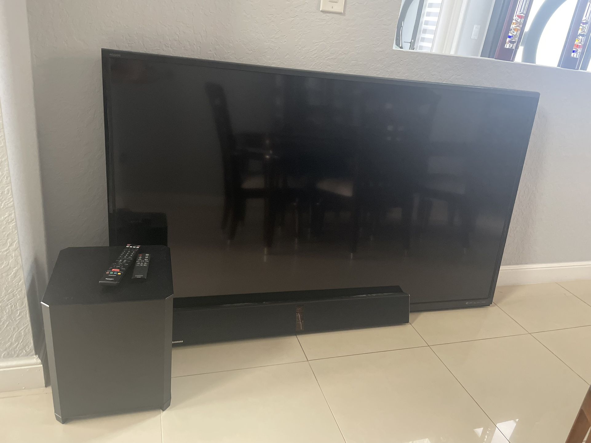 70 inch Sharp  Tv With Samsung Sound Bar and Subwoofer excellent Condition 