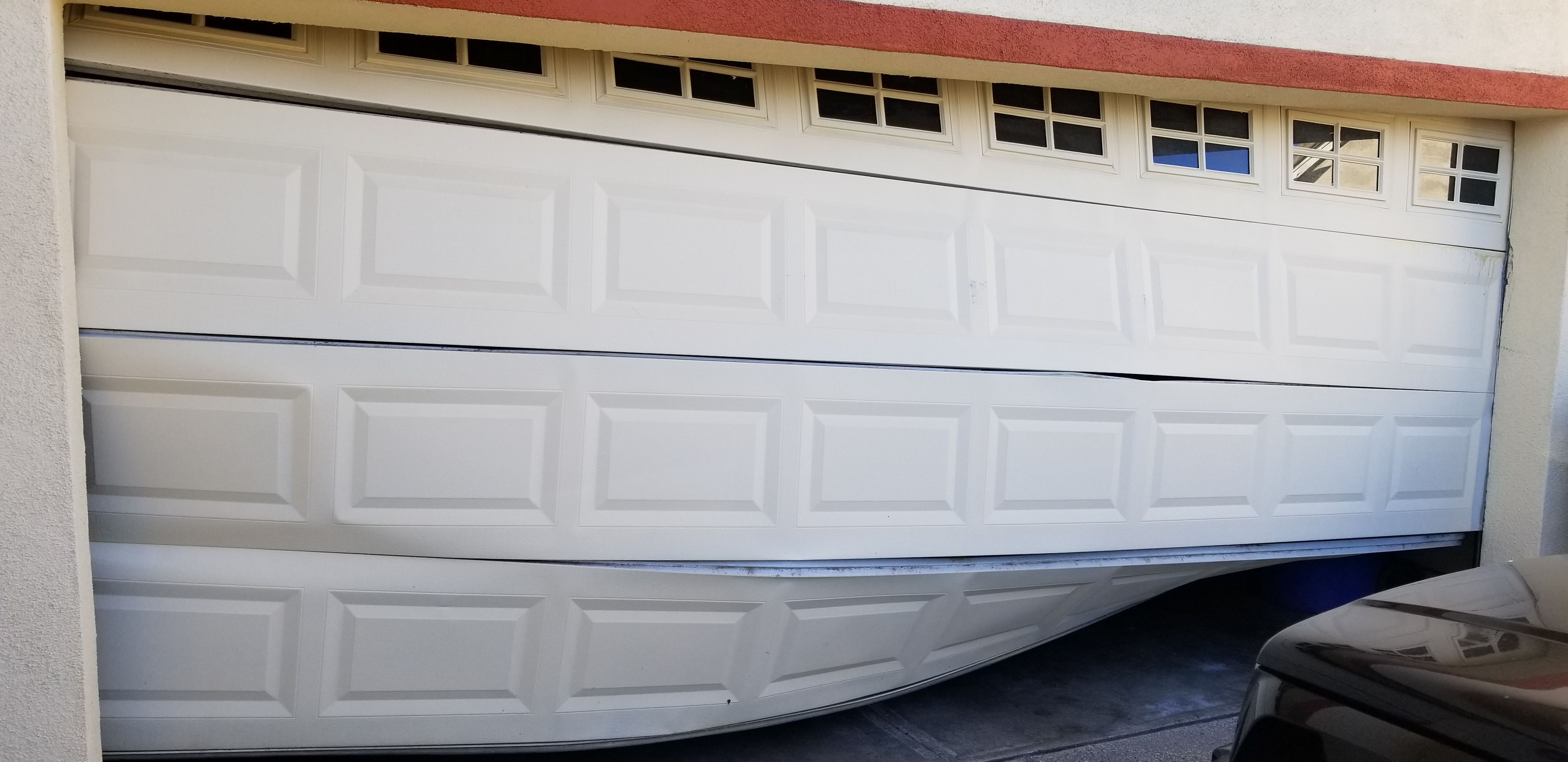 Garage door and rollers