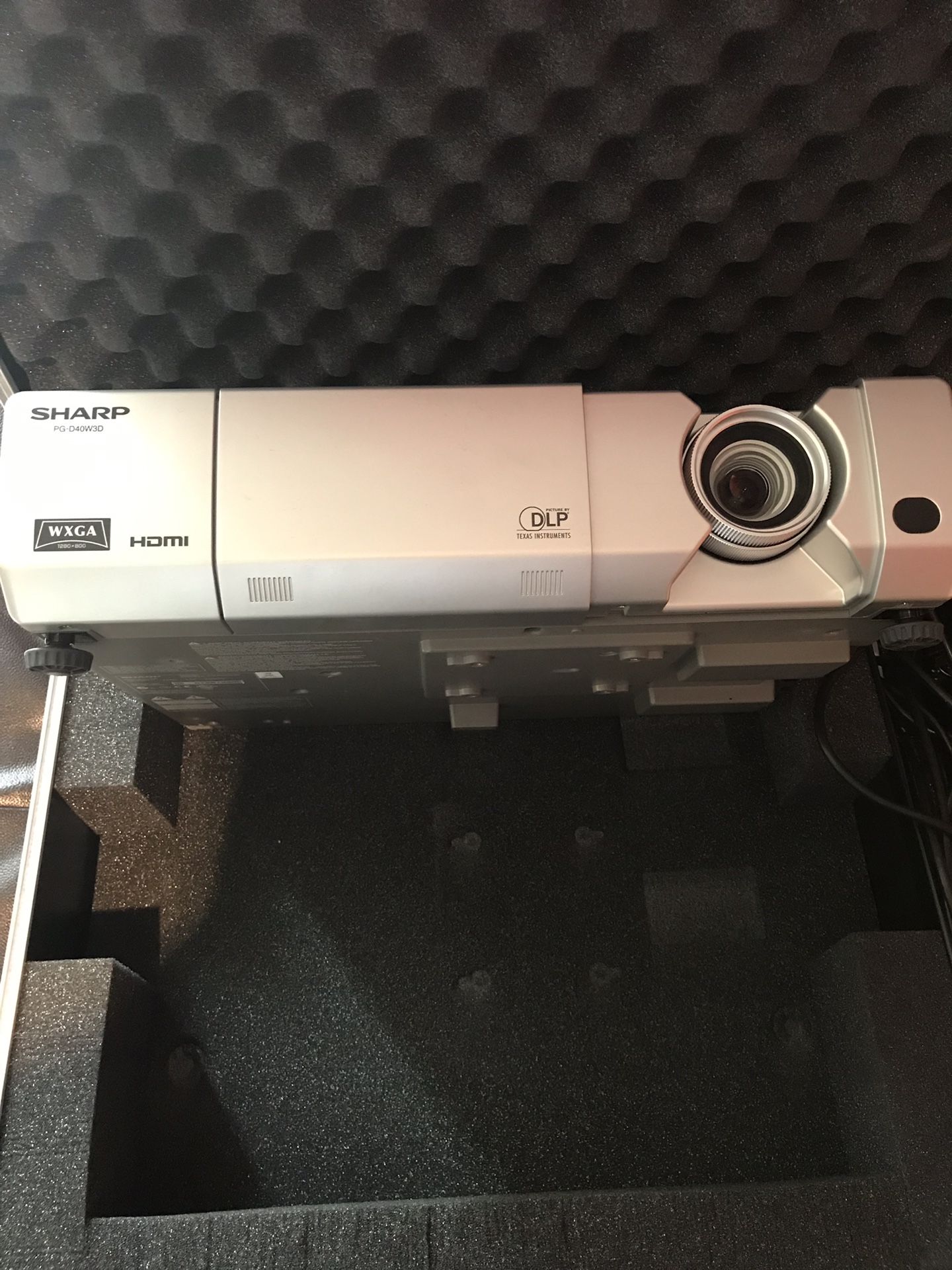 Barely used sharp projector in case