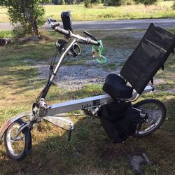 E-Bike Classic, saddle bags, windshield, suspended seat that floats with the weight of individual, originally $1700 bike. Leader in it’s field, 