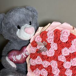Teddy Bear And Fake Flowers 