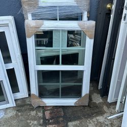 Window Brand new double glass vinyl  Milgard brand  Width  25 inches  Height 36 inches 