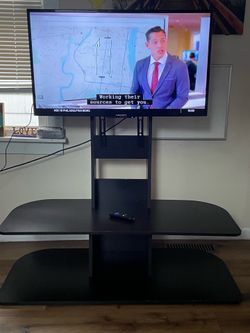 40 inch TV with stand and Roku streaming device