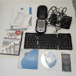 Palm M130. Palm. Palm Pilot. Keyboard. Dock