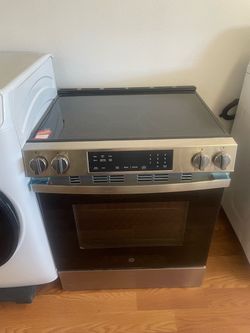 New refurbished GE slide in range