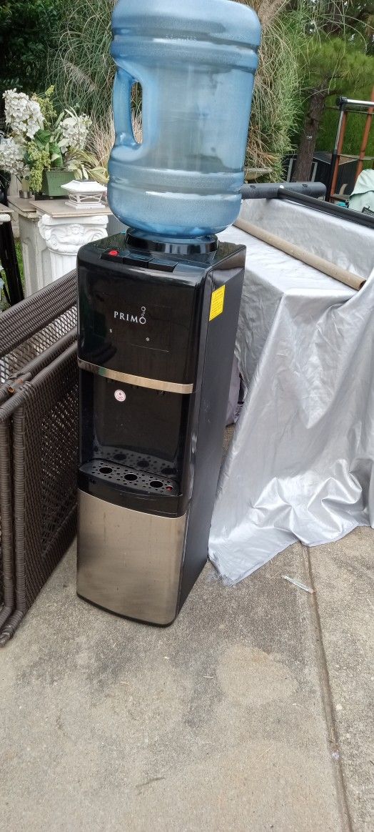 Water Cooler Hot/Cold. Only Use A Few Times. We had It In Office