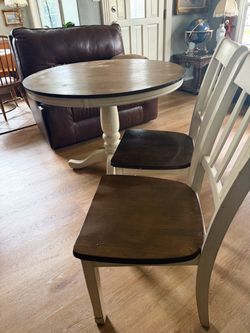 Dining table and two chairs