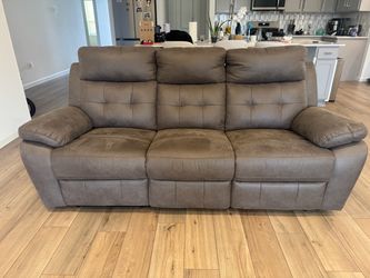 Reclining sofa and stationary love seat