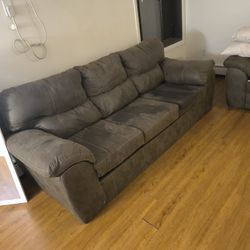 A Couch A Brand New Printer That I Used One Time A Guitar