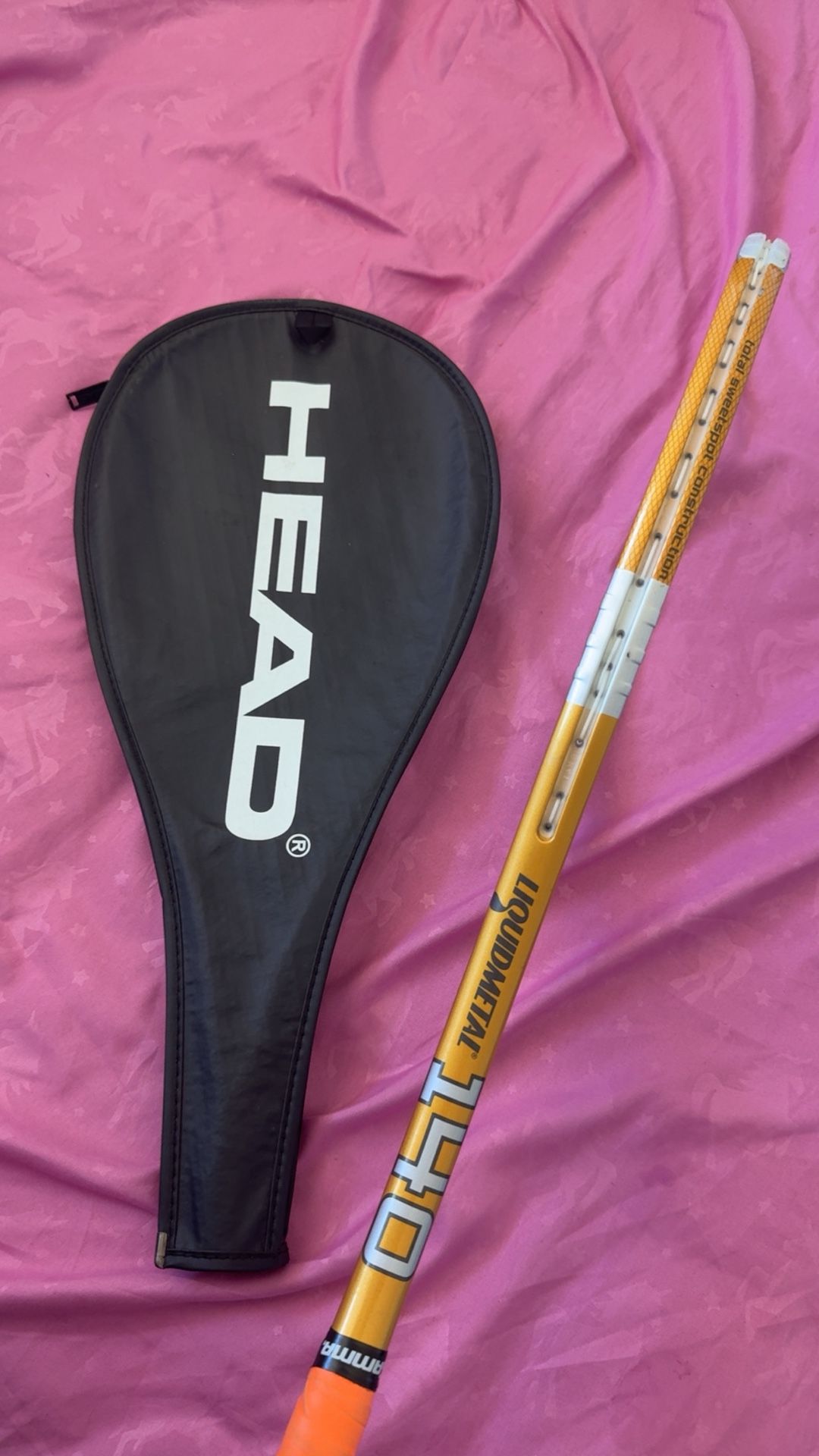 This racquet features Head's Liquidmetal technology,