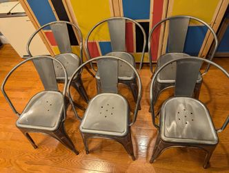 Six Stackable Metal Dining Chairs