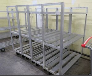 Commercial Aluminum freezer/cooler shelves and Carts shelving without wheels start at $50 with 2 sheves and the ones with wheels start at $150-$200 ea