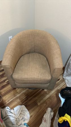 Beige Upholstered Swivel Barrel Chair