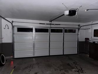 Overhead Garage Door Broken Spring Opener Off Track  Adjustment Replace And Parts