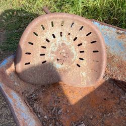 Very Old Tractor Metal Seat.