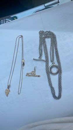 14K solid yellow gold 2.7 Grams/  .925 Silver 17 Grams