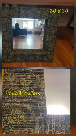 Elegant fabric framed mirror. Dimensions included. $20. Used and in very good conditions.