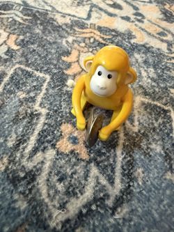 Cymbal-Banging Monkey Wind-Up Toy. 
