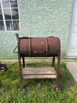 Barrel barbeque pit