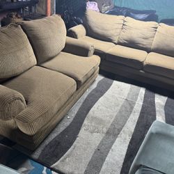 Brown Ashley furniture couch and love a good condition clean we sell all the time delivery extra $40 local