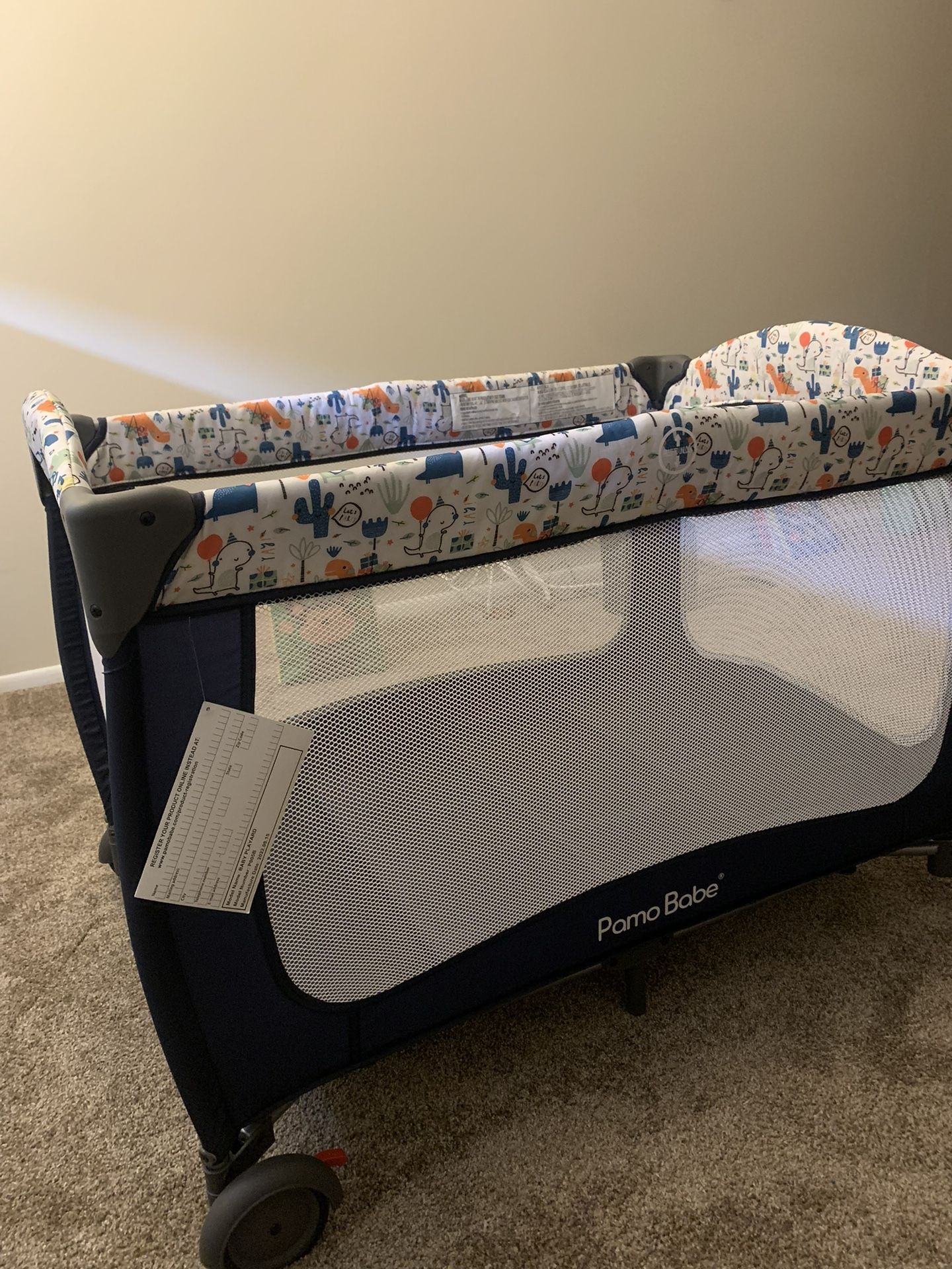 Pamo Babe Portable Crib ( NEW ) And Changing Table