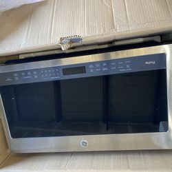 Brand new open box GE Profile™ Series 2.1 Cu. Ft. Over-the-Range Sensor Microwave Oven Stainless Steel retails at $650 Can Deliver Dimensions:17 5/16