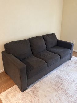 Dark Gray Sleeper Sofa with Unused Mattress