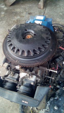 200 hrs. pw. evinrude parts new flywheel