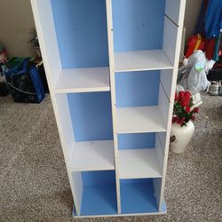 22 W By 48 L Solid Wood Shelf Blue & White With Adjustable Shelves Will Need To Pick Up To Heavy For Me To Move It