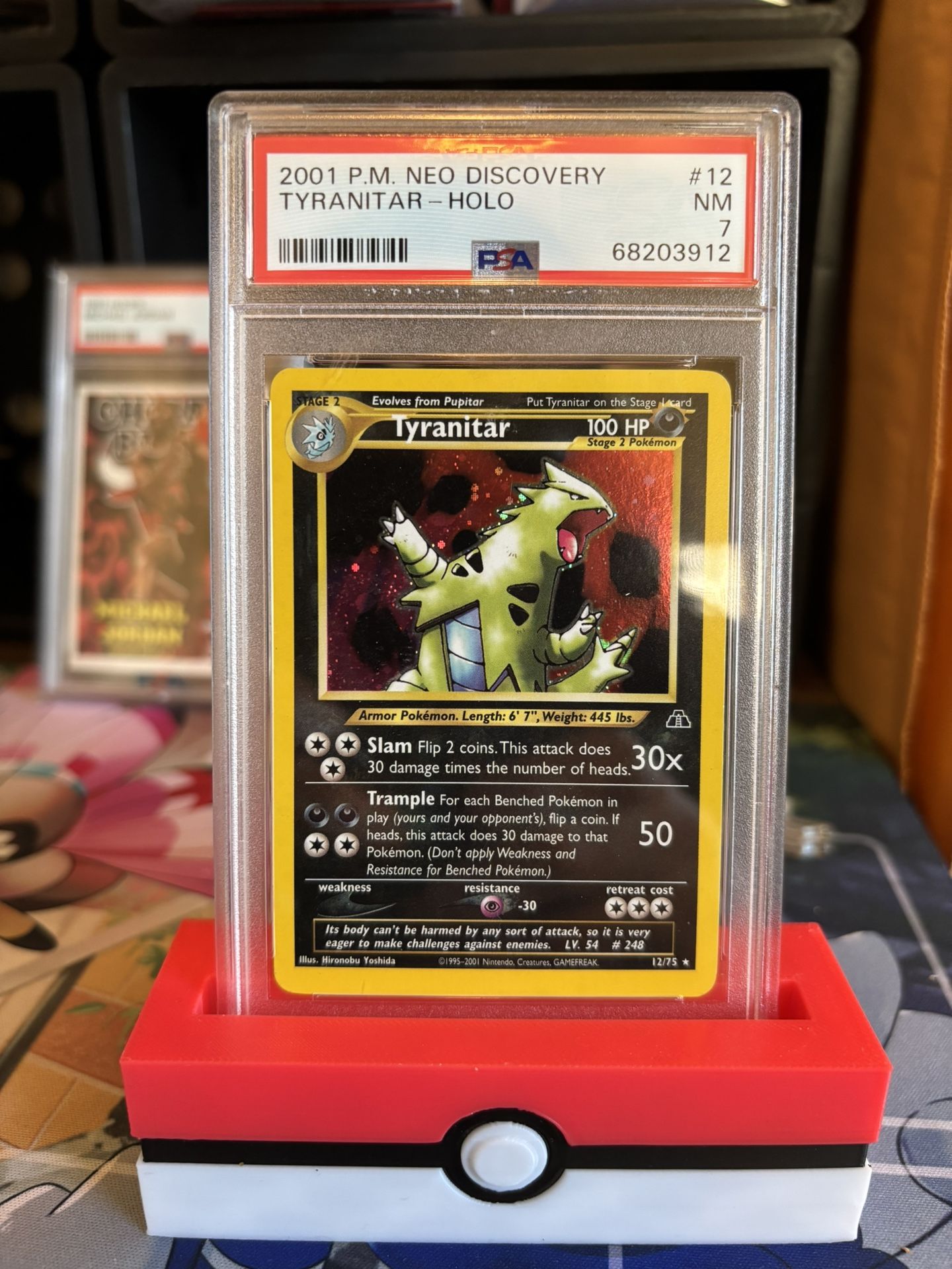 PSA 7 NM Tyranitar Holo #12 (2001) Pokemon Neo Discovery English